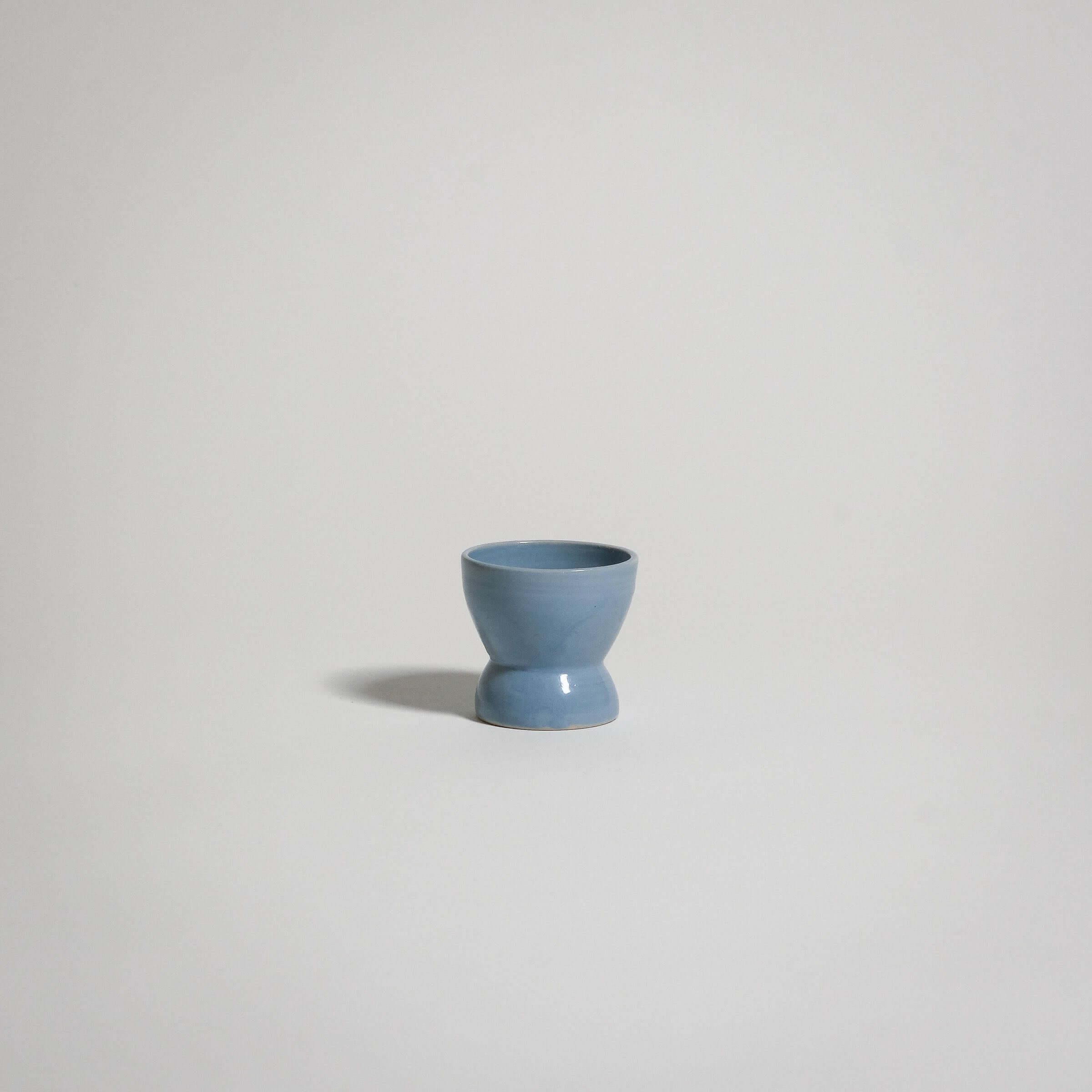 A classic ceramic Egg Cup in the color ice blue