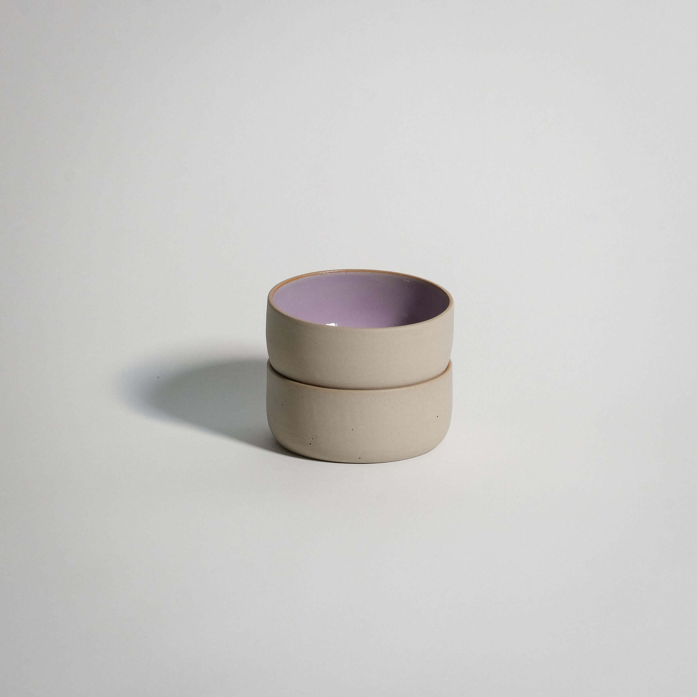 Handcrafted stoneware snack bowl set with glossy pink glaze, ideal for snacks and everyday use.