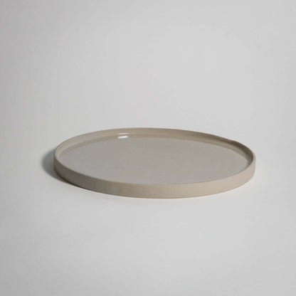 Handcrafted round Dinner Plate in creme color, durable stoneware ceramic with transparent glaze, oven and dishwasher safe.