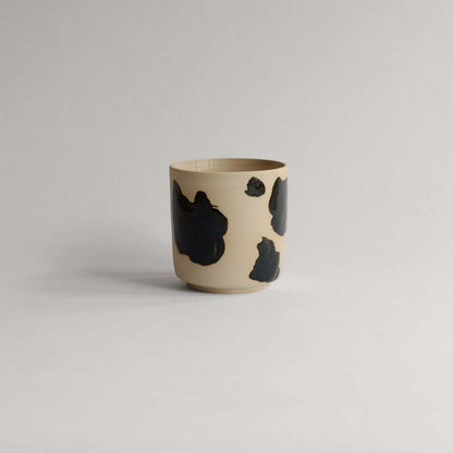 Discover the Nomi Pepe Tea Cup, 270ml of crafted joy. Grey stoneware with food-safe glazes, each cup's brush strokes tell its own story. Shop now! from viola beuscher ceramics