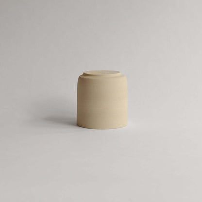 Unique Nomi Creme Tea Cup, 270ml, raw exterior, glossy finish. Perfect touch of artisan craftsmanship for your tea moments. from viola beuscher ceramics