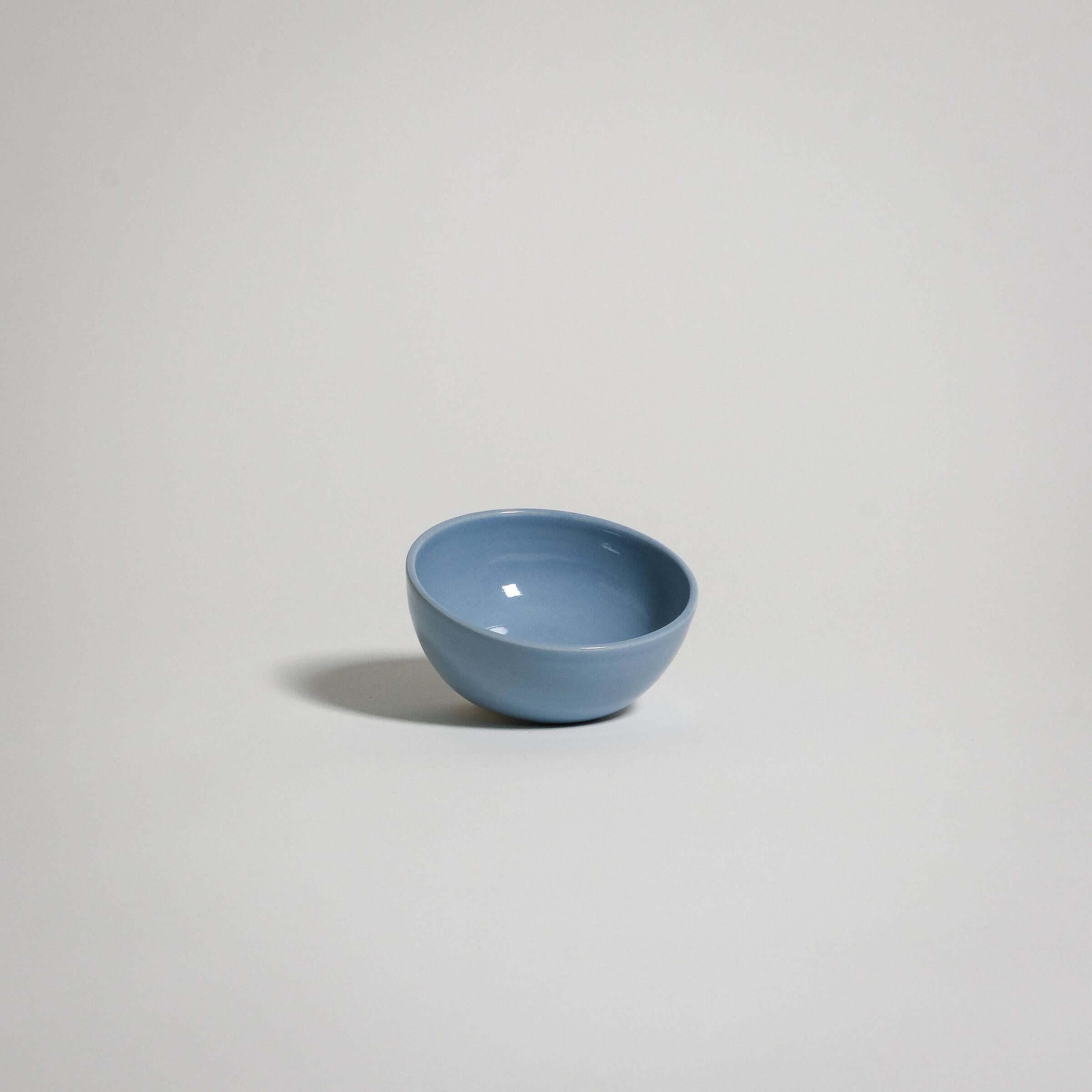 Handcrafted Mini Bowl Yun in iceblue glaze, perfect for snacks, dinner, or breakfast. Unique stoneware, dishwasher and oven safe.