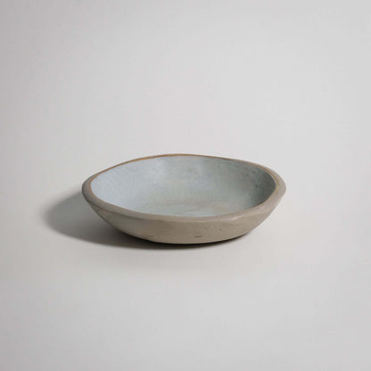 Handbuilt dinner bowl in matte white glaze, food-safe, crafted from grey stoneware clay.