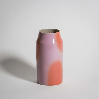 Pink and orange medium vase made of grey stoneware with glossy glaze and airbrushed color dots.