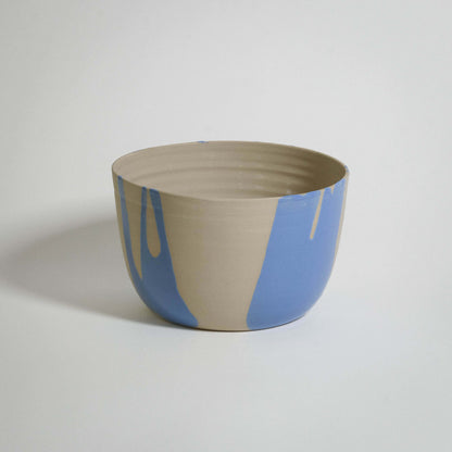 Splash Planter Blue, handmade stoneware ceramic with light blue glaze, unique and food-safe planter for stylish decor.