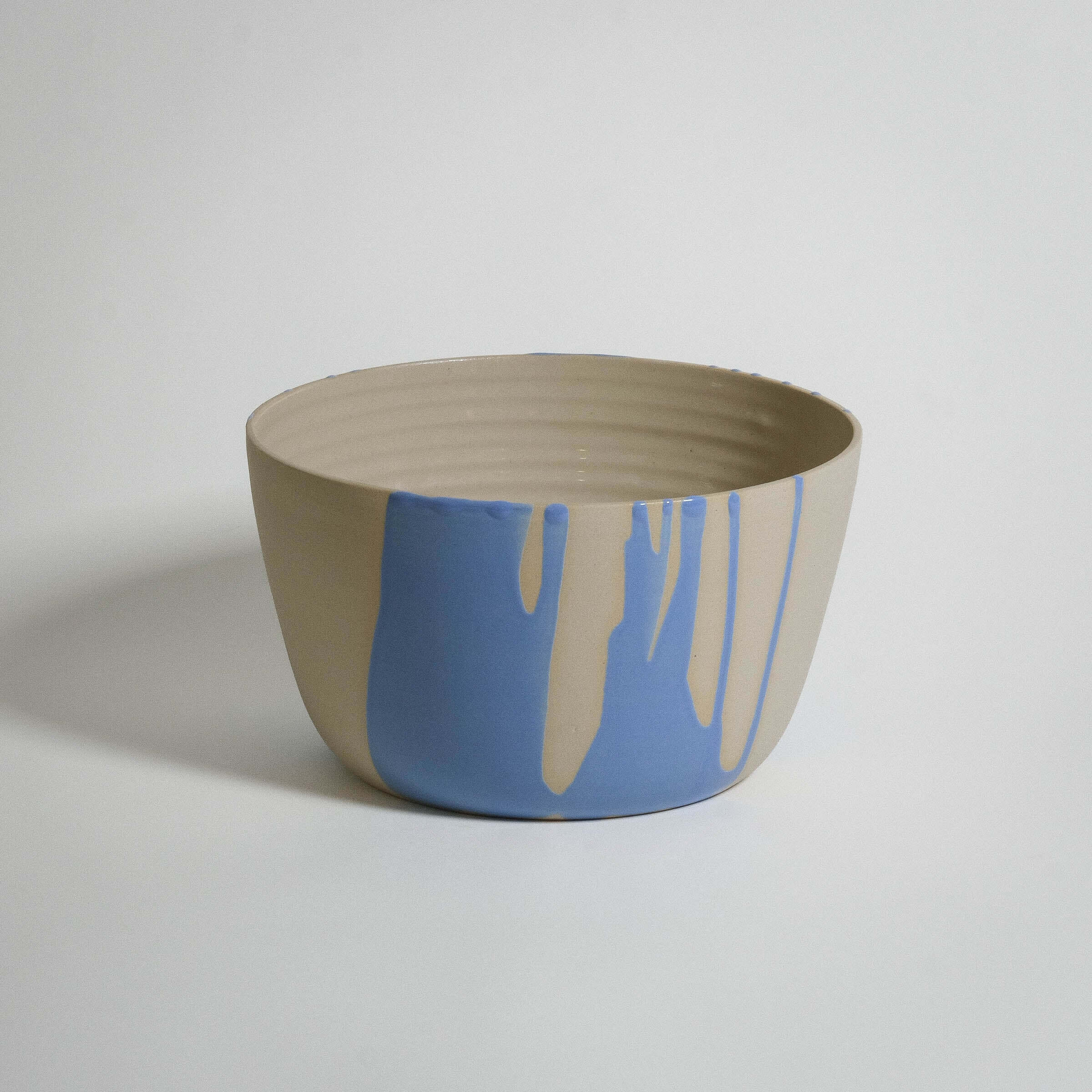 Durable stoneware ceramic Splash Planter Blue with unique glaze, ideal for home decor and plant display.