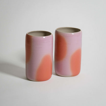 Pink and orange medium vase set made from grey stoneware with a glossy glaze and airbrushed color dots.