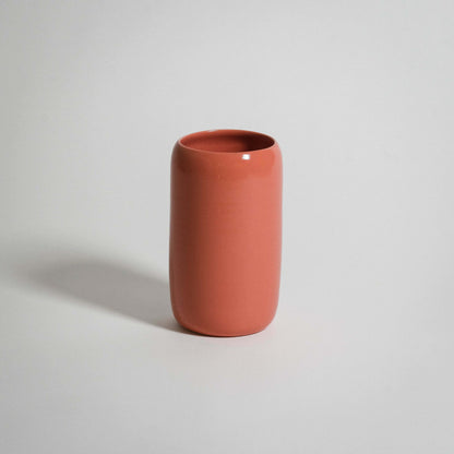 Handcrafted orange medium vase, made from stoneware with a glossy finish, perfect for adding elegance to any decor.