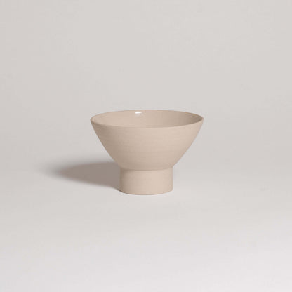 Small beige dessert bowl with sculptural shape, matte finish, suitable for desserts and side dishes, made in Frankfurt.