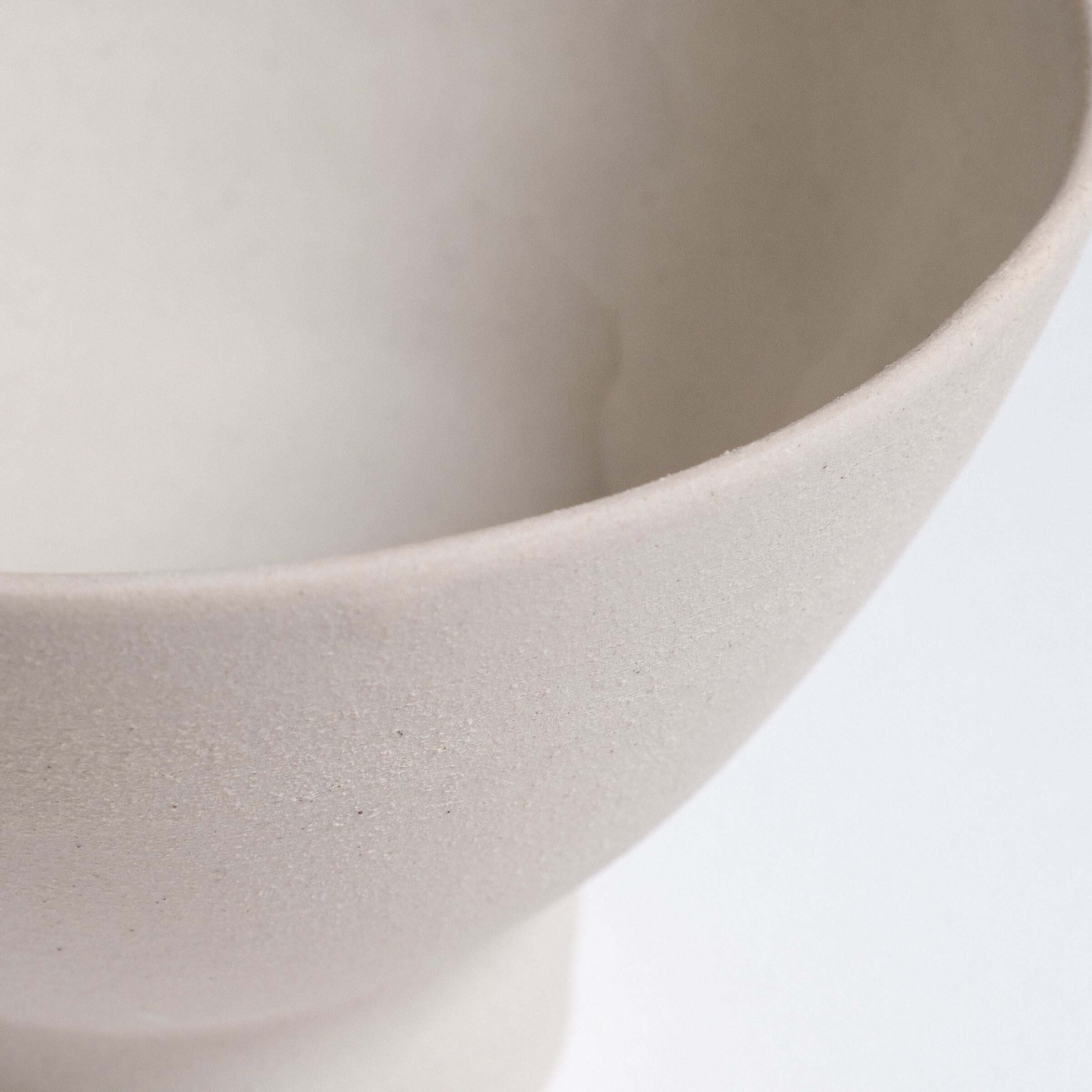 Small ceramic dessert bowl in matte exterior, handcrafted for serving desserts or side dishes. Dishwasher safe and limited edition.