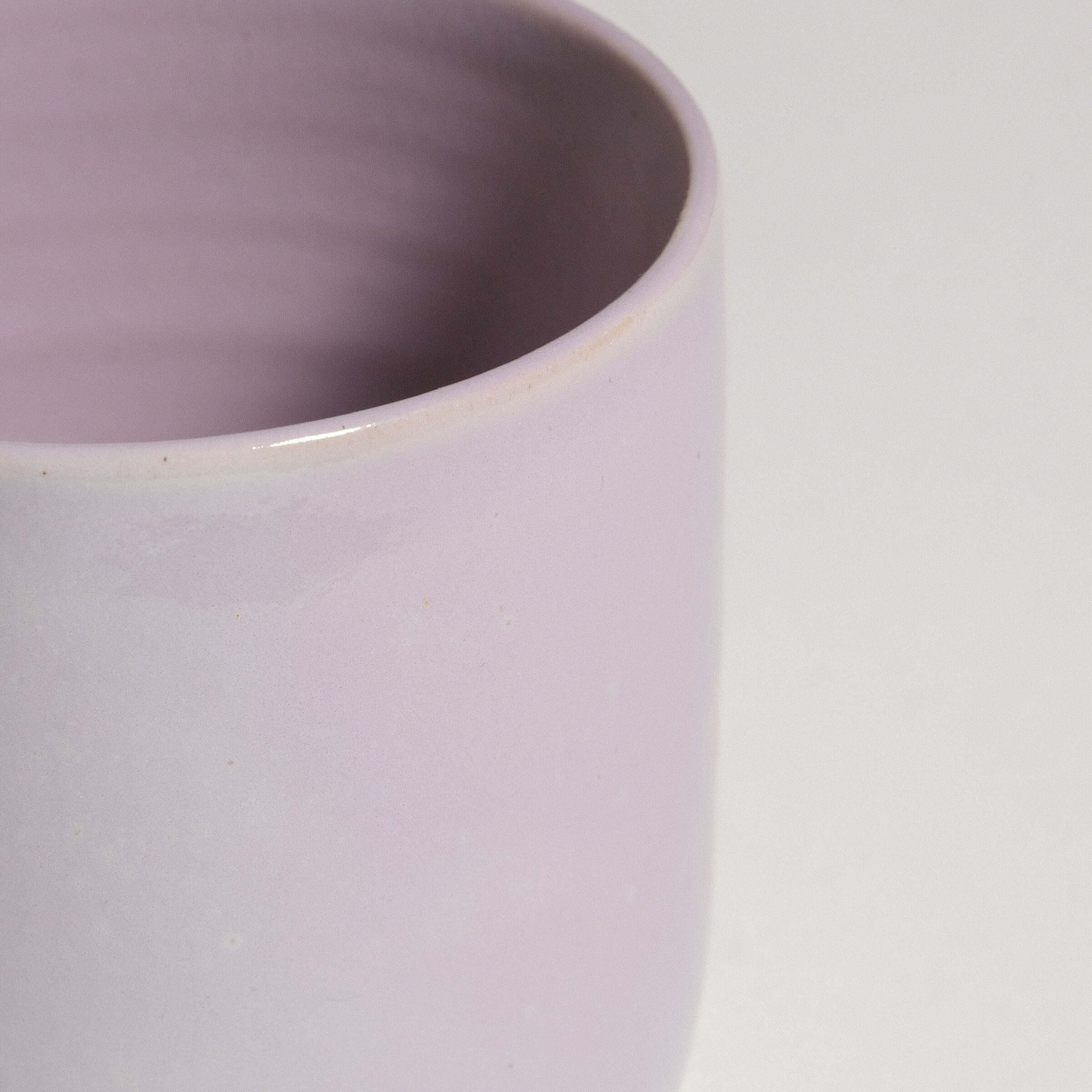 Handmade lilac tea cup from Frankfurt, Germany, with a smooth food-safe glaze, perfect for daily rituals.